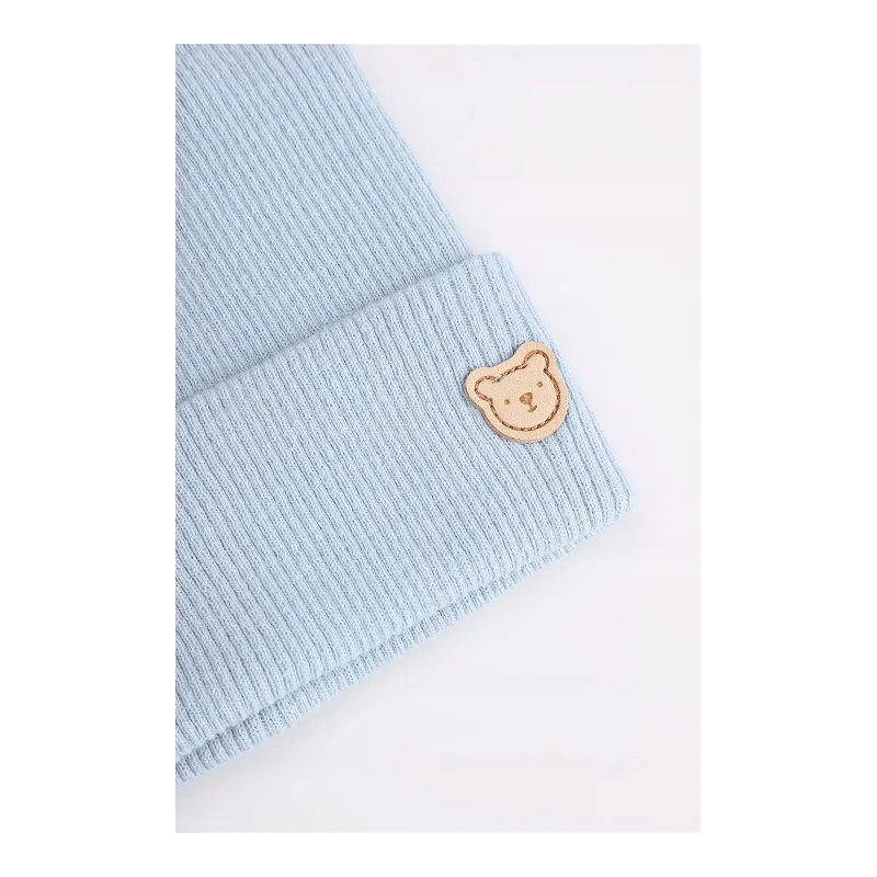 BŁĘKITNA CZAPKA DLA NIEMOWLĄT Z USZKAMI 3–6 M COCCODRILLO